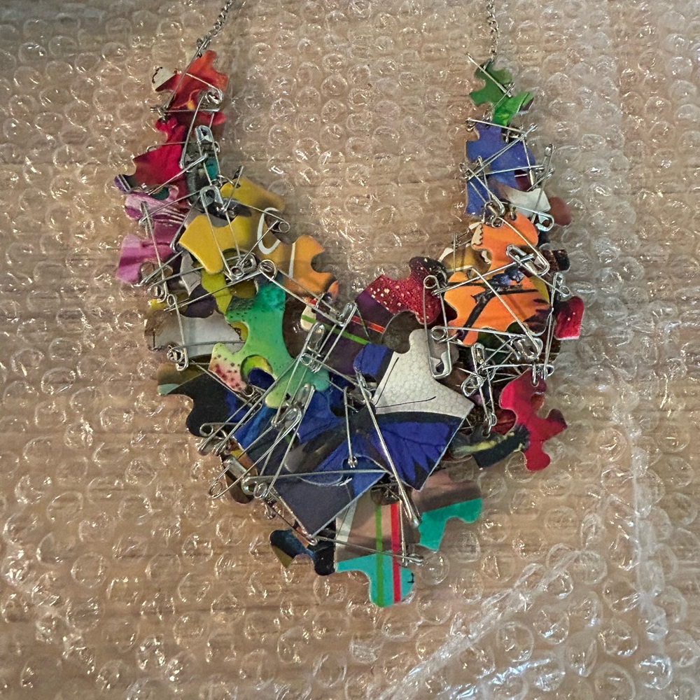 Realm by Jesse Walker Butterfly puzzle necklace